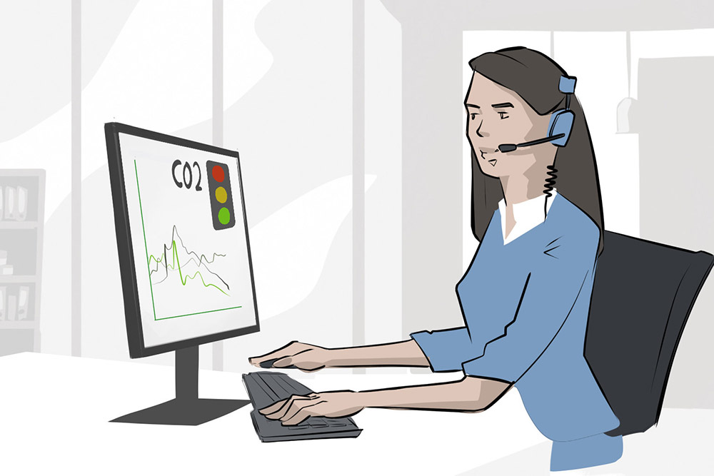 Illustration Frau am PC schaut auf CO2 Ampel